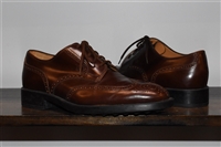 Mahogany Tod's Derby, size 10