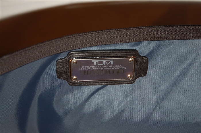 Basic Black Tumi Luggage, size L