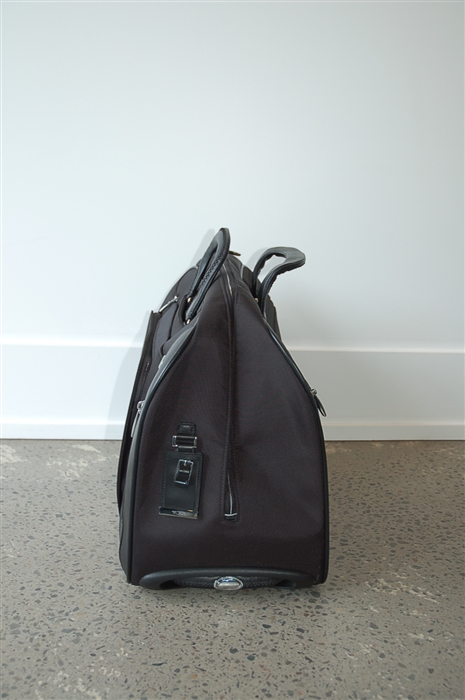 Basic Black Tumi Luggage, size L