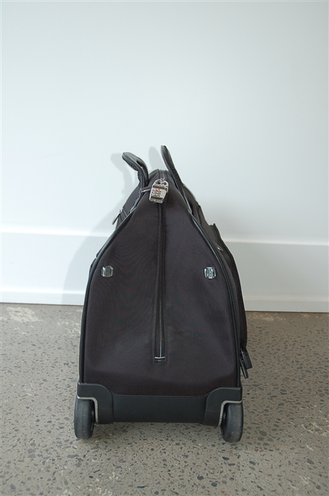 Basic Black Tumi Luggage, size L