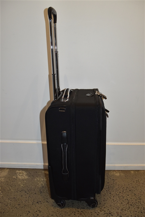 Basic Black Tumi Luggage, size M